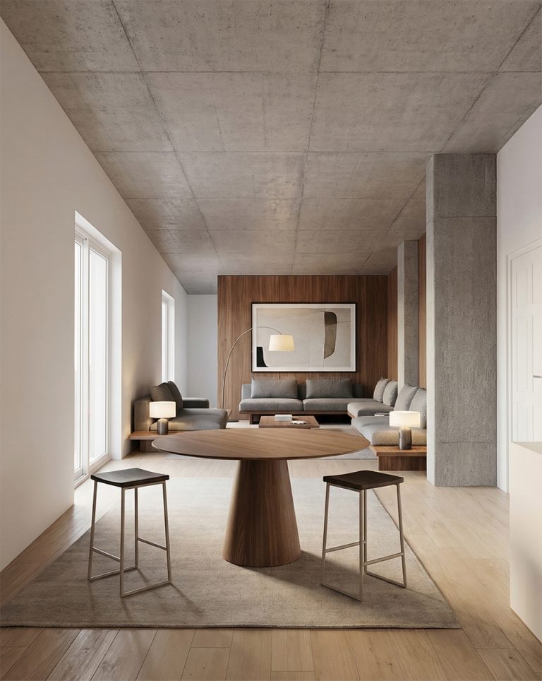 Tableau rond en bois et tabourets dans un salon moderne en béton